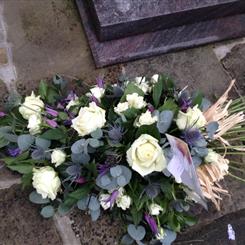 Funeral Flowers - A Beautiful Rose and Thistle Spray