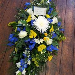 Funeral Flowers - A Double Ended Spray in Blue Yellow and White