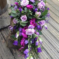 Funeral Flowers - A Gentle Lilac and Purple Spray Single Ended